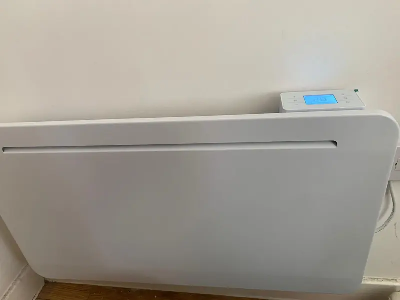 New digital panel heater fitted to a wall